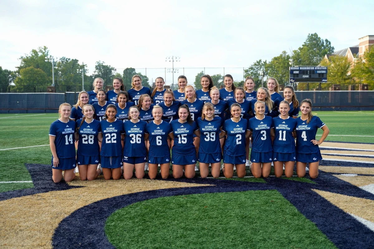 GW Women's Lacrosse team photo on the turf