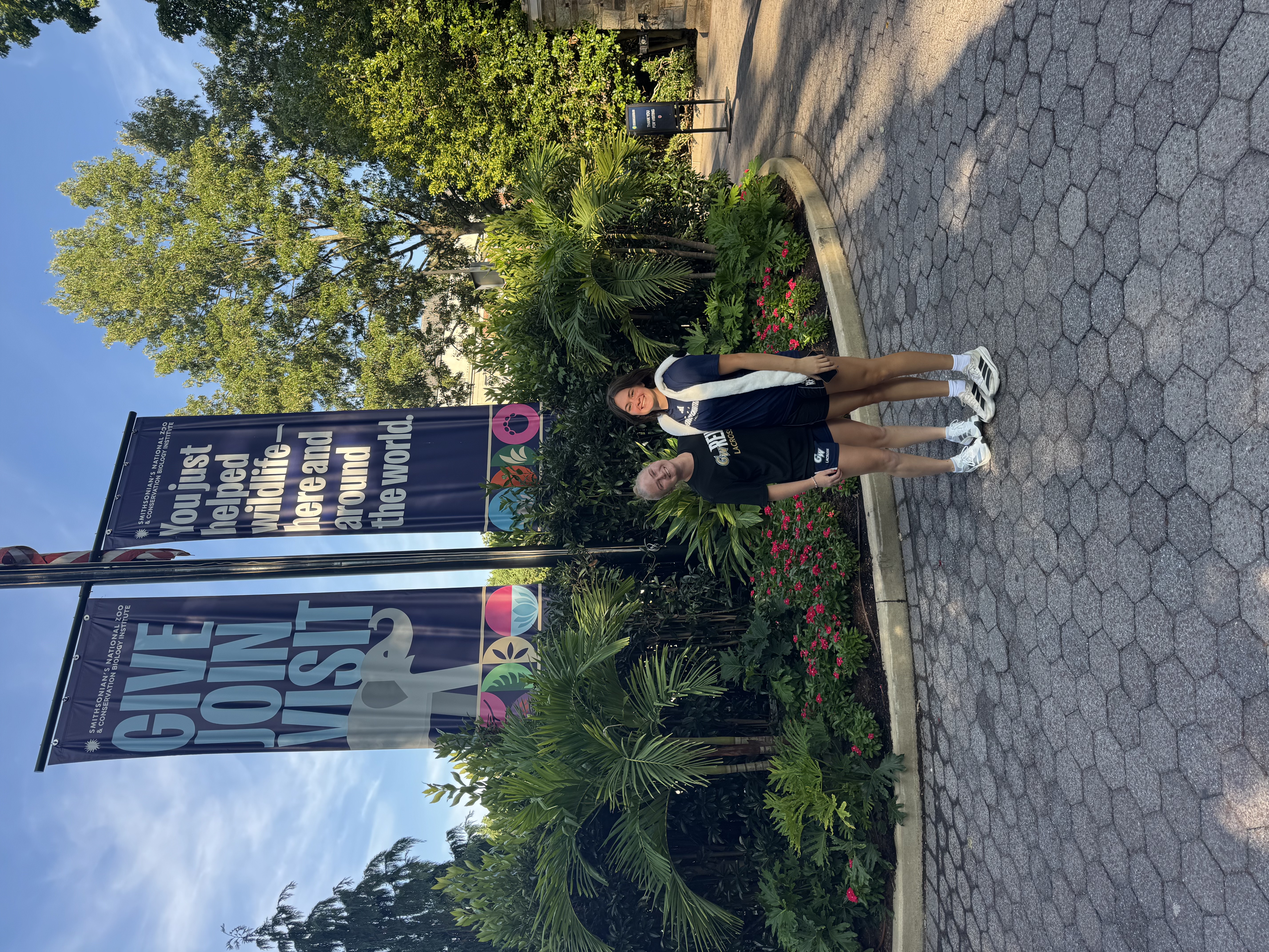 Teammates at the National Zoo entrance